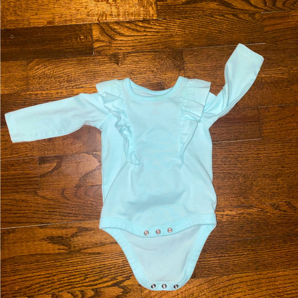 Front ruffle newborn onesie